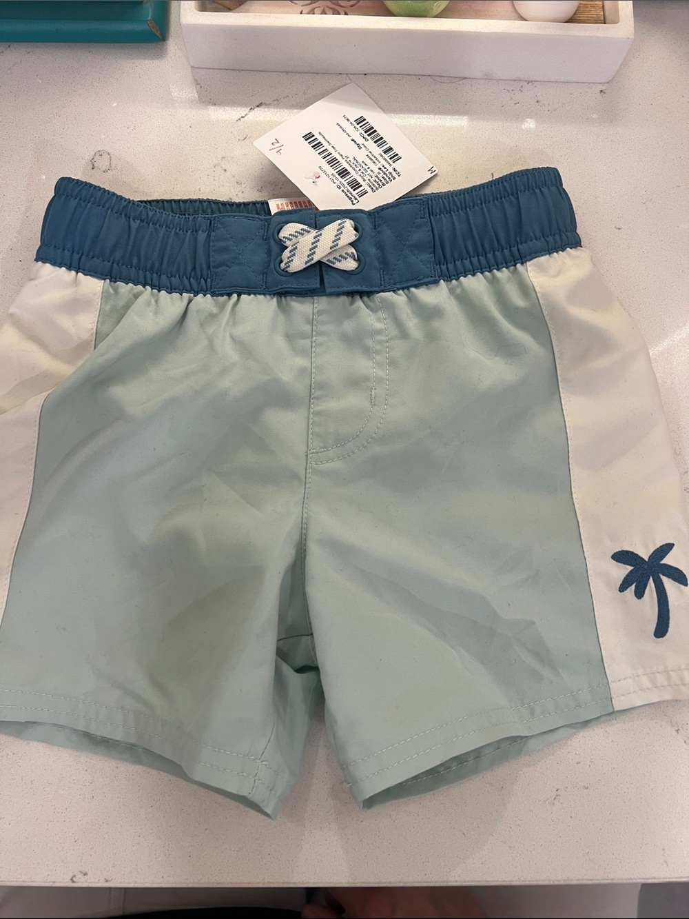 Cat & Jack Light Blue Swim Shorts with Navy Waistband and White Side Panels